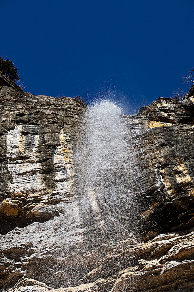 Closeup From Underneath Hemmed In Hollow Falls